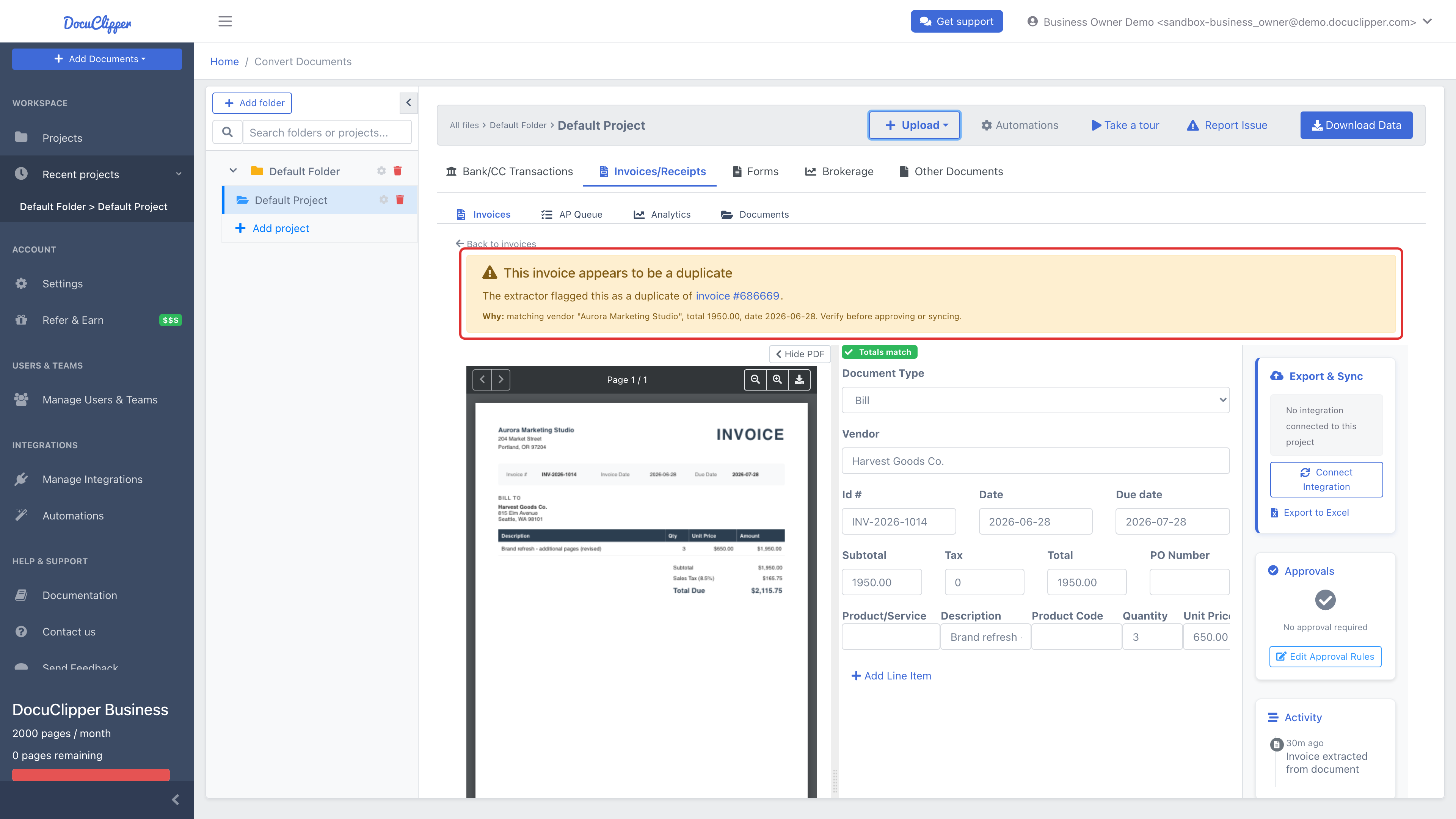Invoice editor with a yellow "This invoice appears to be a duplicate" alert at the top